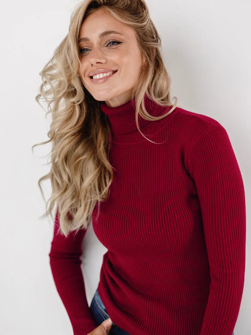 Confortable pull à col roulé pour femme, un vêtement polyvalent pour toute garde-robe féminine.