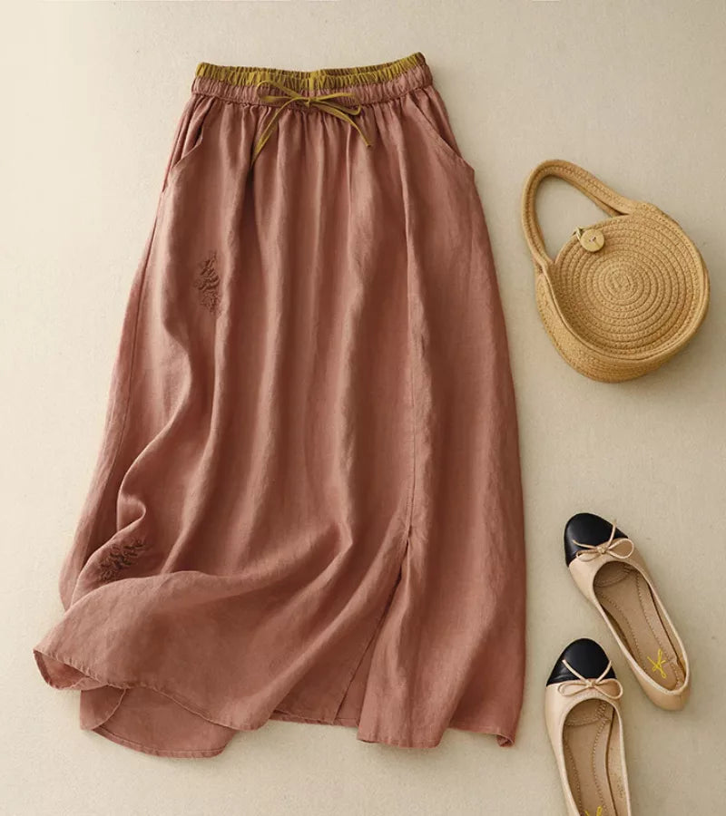 Jupe brodée femme mi-longue taille haute A-line, élégante et chic pour l'été.