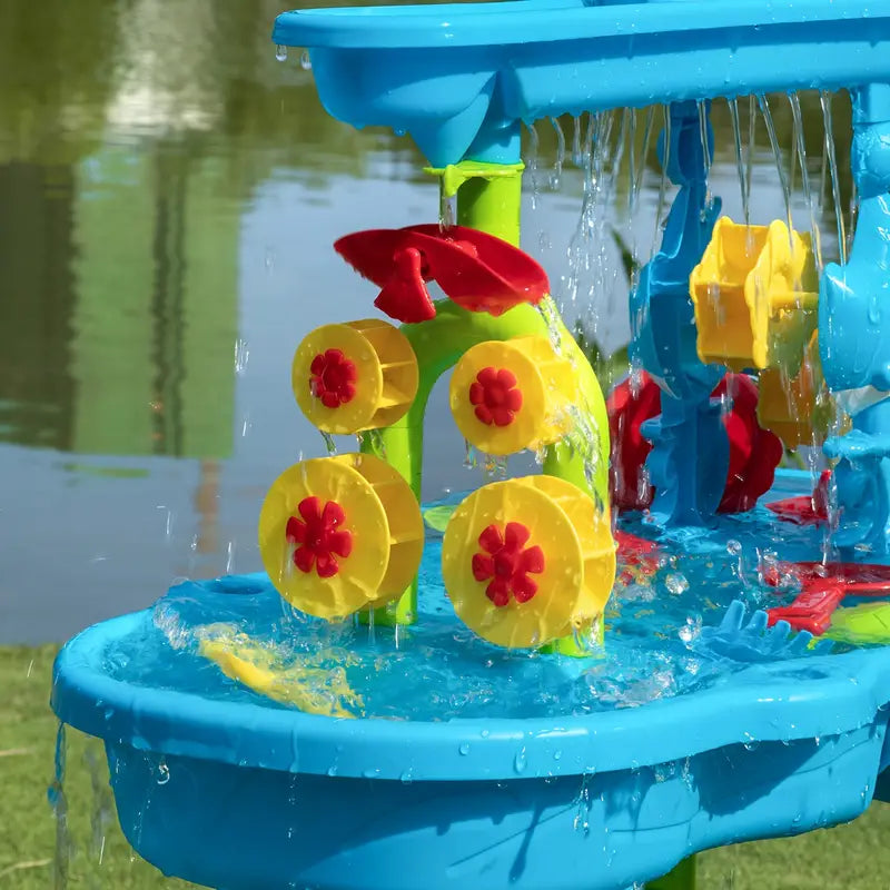 Table multi-activités sable et eau à 3 niveaux pour enfants, favorisant le développement et le jeu en extérieur.