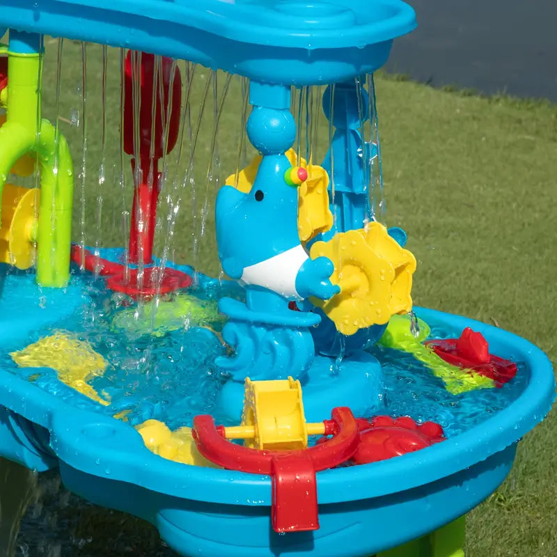 Jouet d'extérieur, table de sable et d'eau à 3 niveaux, offrant des heures de jeu créatif pour les enfants en été.