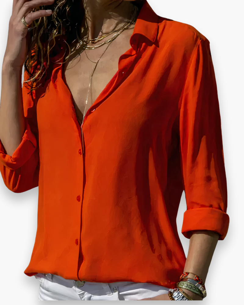 Blouse femme chic, parfaite pour une tenue de bureau ou un look casual. Disponible en plusieurs couleurs.