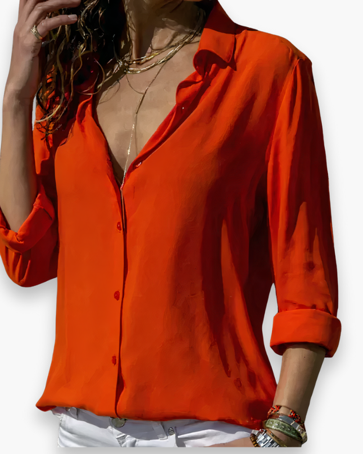 Blouse femme chic, parfaite pour une tenue de bureau ou un look casual. Disponible en plusieurs couleurs.