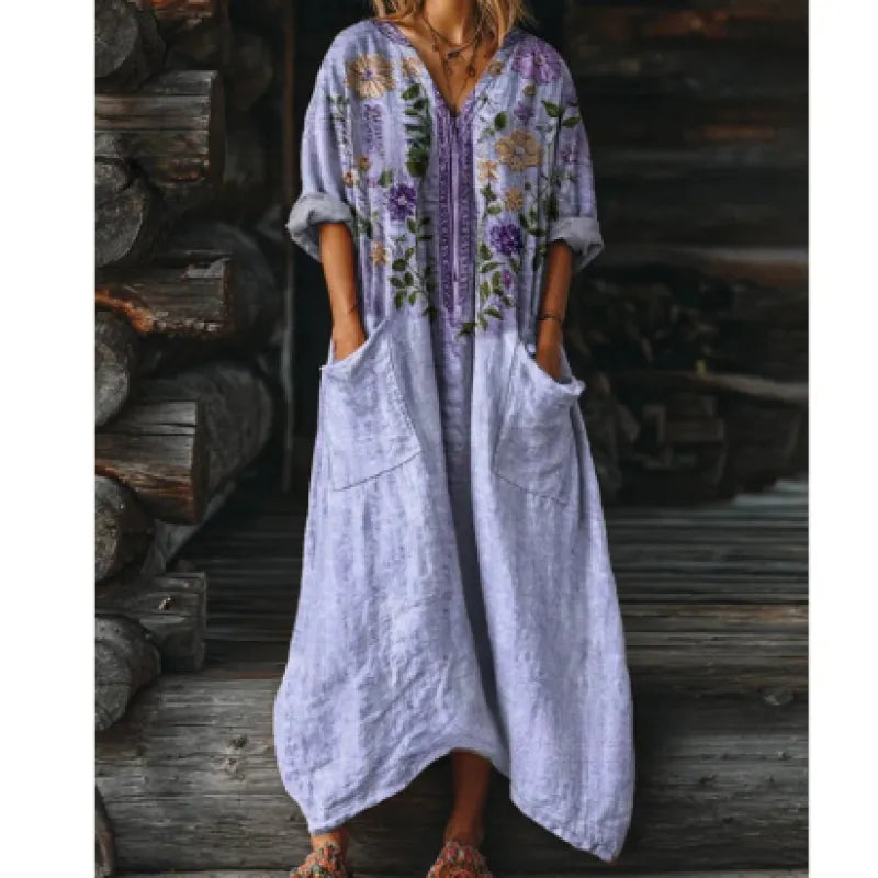 Robe longue femme à motif floral vintage avec col V flatteur et poches pratiques, style chic et confortable.