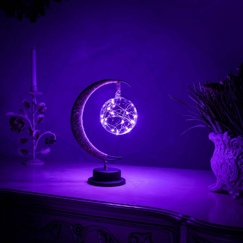 Lampe LED LunaSphere en forme de lune diffusant une lumière chaude et apaisante pour une ambiance cosy.