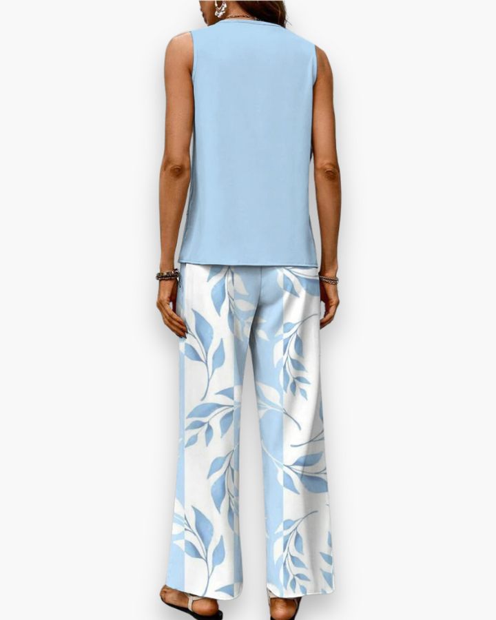 Ensemble femme chic avec pantalon fluide et haut sans manches, parfait pour un look d'été confortable.