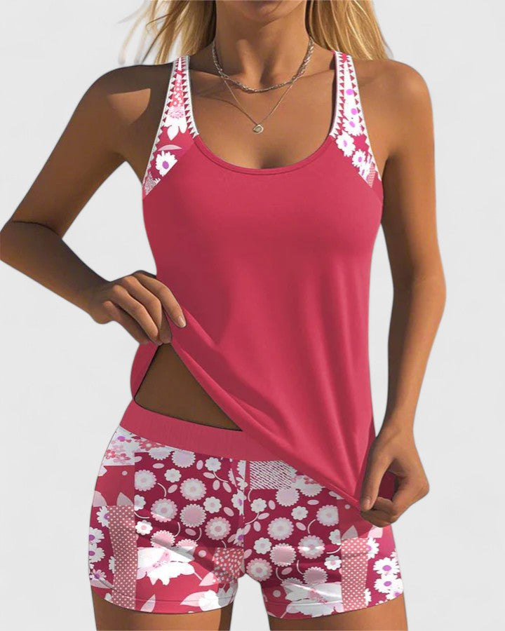 Maillot de bain deux pièces sportif: Tankini femme, dos nageur, top uni et short floral tendance été.