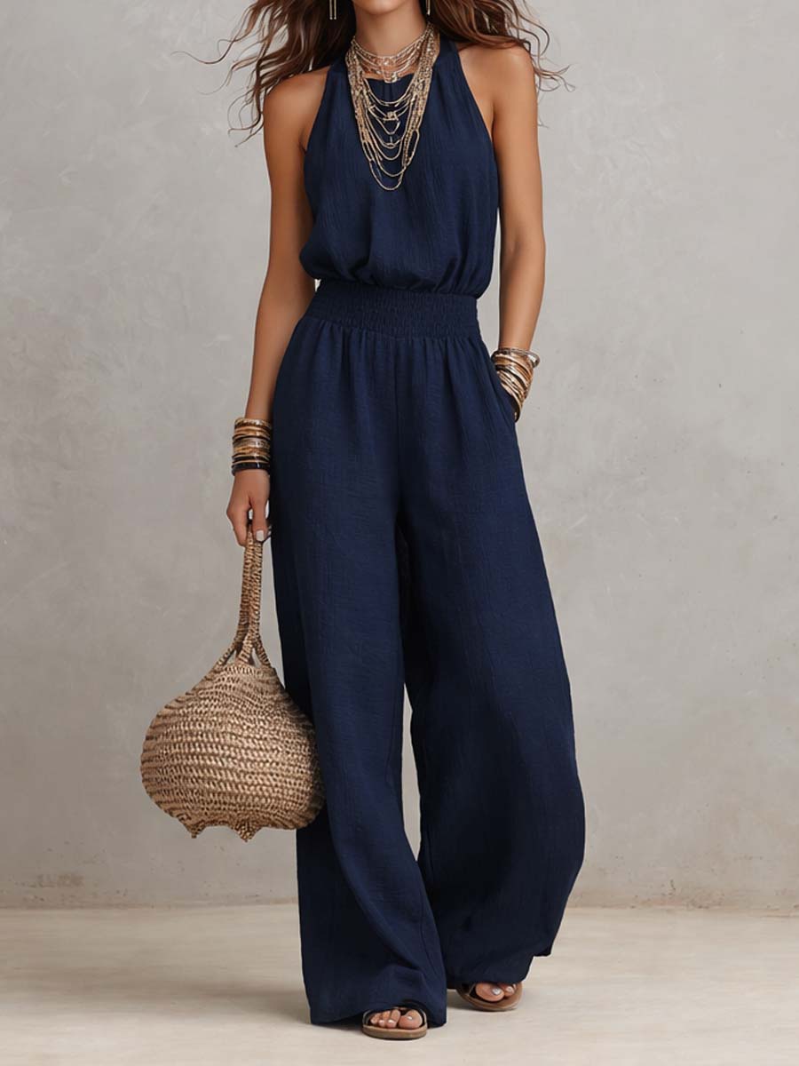 Tendance estivale: combinaison fluide femme halter, jambes larges, pour look chic et décontracté.