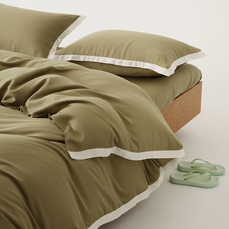 Tencel respirant et doux pour cet ensemble de literie patchwork luxueux, idéal pour le confort d'une chambre moderne.
