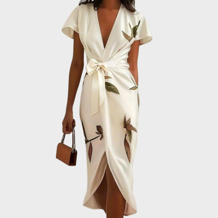 Robe midi portefeuille femme élégante, imprimé floral coloré, manches courtes, col V. Parfaite pour le printemps/été.
