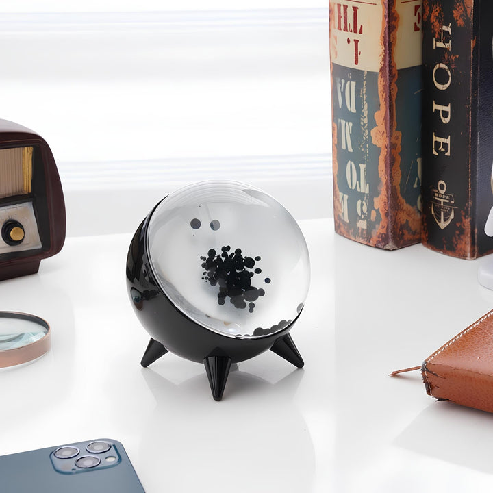 Lampe d'ambiance bluetooth avec affichage ferrofluide. Connectez votre musique pour un spectacle lumineux interactif.