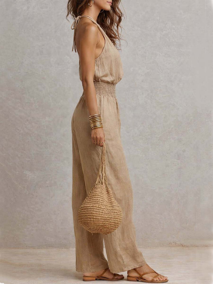 Combinaison fluide femme halter décontractée chic à jambes larges. Parfaite pour l'été et vacances.