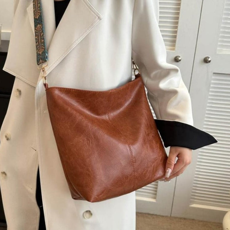 Sac bandoulière polyvalent Wanda en cuir PU, accessoire femme tendance.