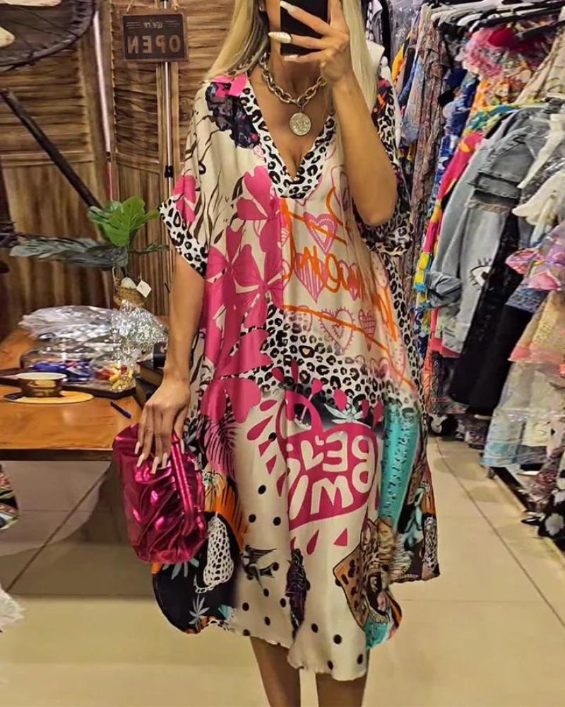 Robe féminine col V coupe ample à motif léopard multicolore, parfaite pour un look bohème chic et confortable.