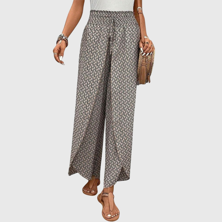Élégant pantalon palazzo taille haute pour femme. Coupe fluide, mode et confort assurés.