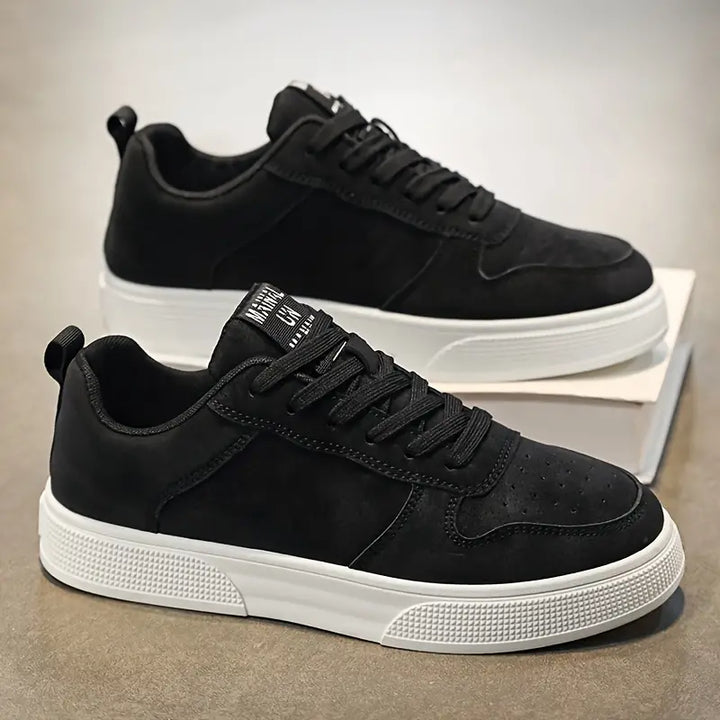 Paire de chaussures homme vertes, style moderne, confort et élégance.