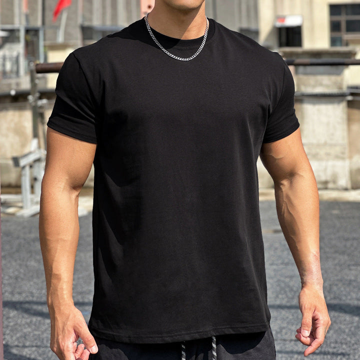 T-shirt sport homme manches courtes, coupe ample moderne. Vêtement athlétique confortable et stylé.