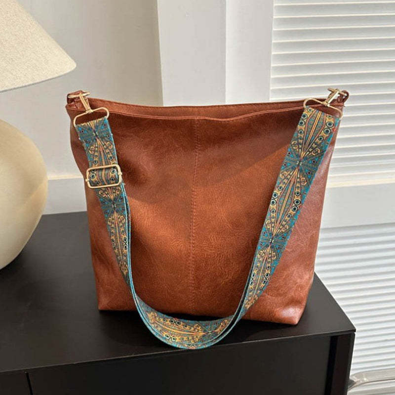 Sac bandoulière Wanda pour femme en cuir PU, accessoire polyvalent et chic.