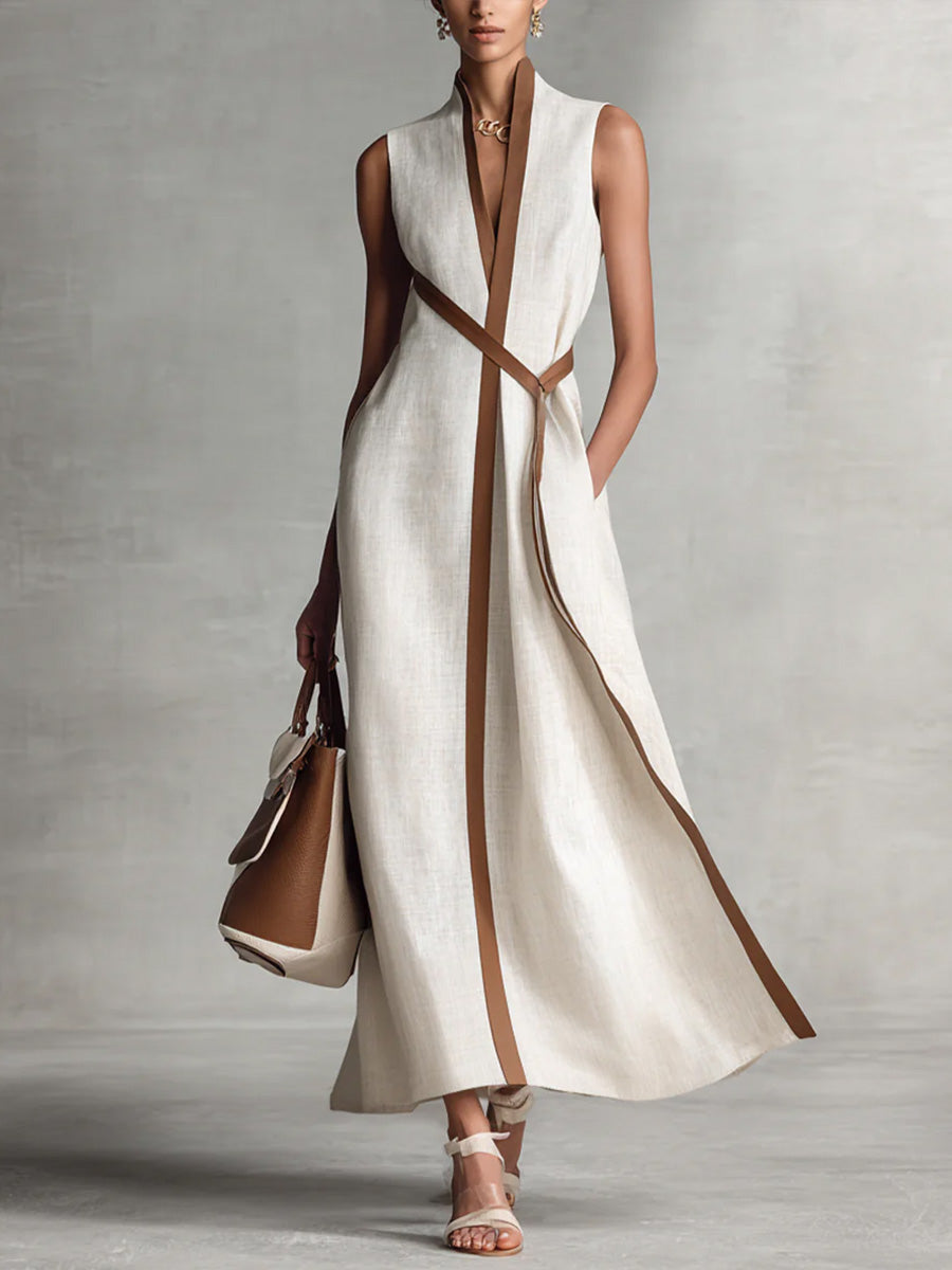 Robe longue femme fluide sans manches, col V, taille croisée, style élégant et minimaliste pour l'été.