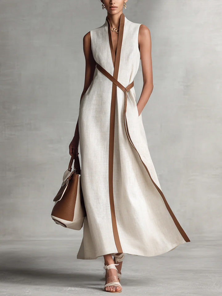 Robe longue femme fluide sans manches, col V, taille croisée, style élégant et minimaliste pour l'été.