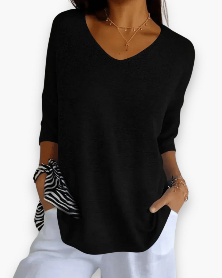 Pull femme polyvalent, décontracté et chic, avec col en V et manches 3/4 pour tout look.