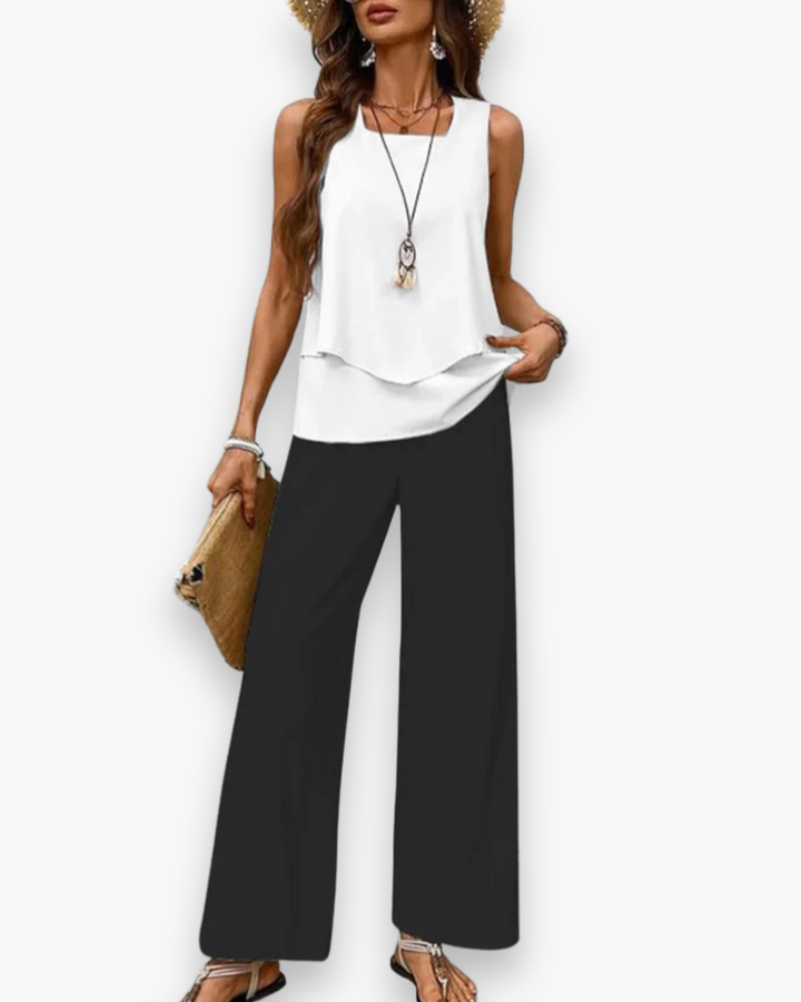Ensemble fluide femme sans manches, élégant et confortable. Tenue d'été chic avec pantalon pour la mode estivale.