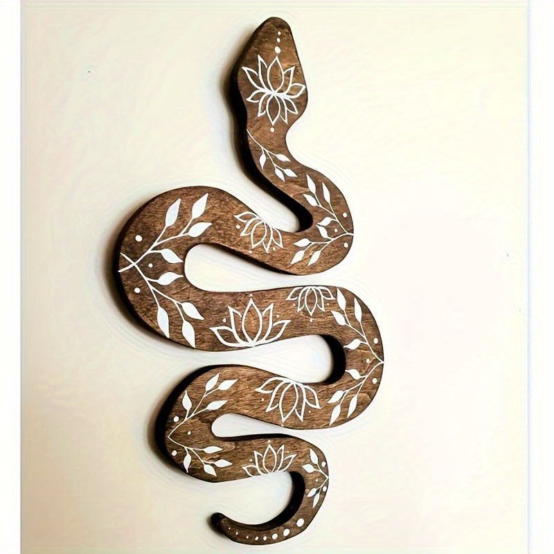 Décoration murale serpent bohème en bois sculpté, ajoutant une touche mystique et artistique à votre intérieur.