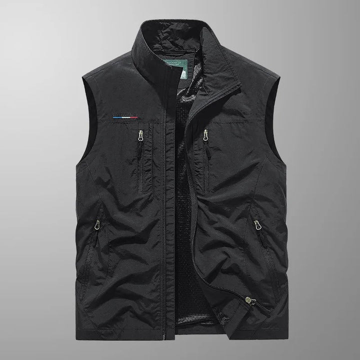 Gilet sans manches homme, polyvalent avec de multiples poches pratiques pour outils, pêche ou photographie.