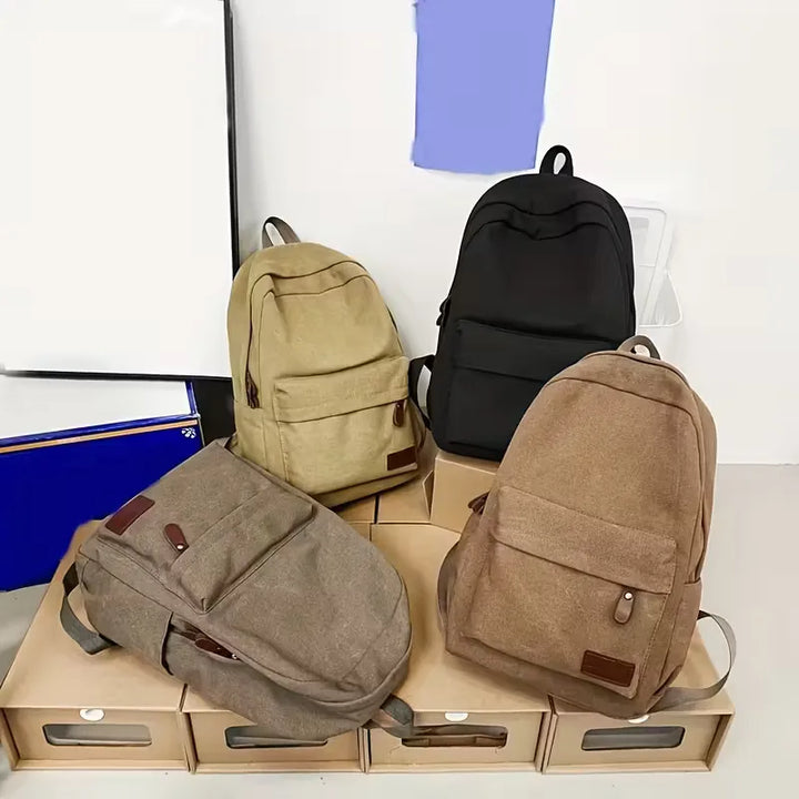 Sac à dos homme polyvalent en canvas, disponible en kaki, marron, noir, vert, pour tous les besoins.