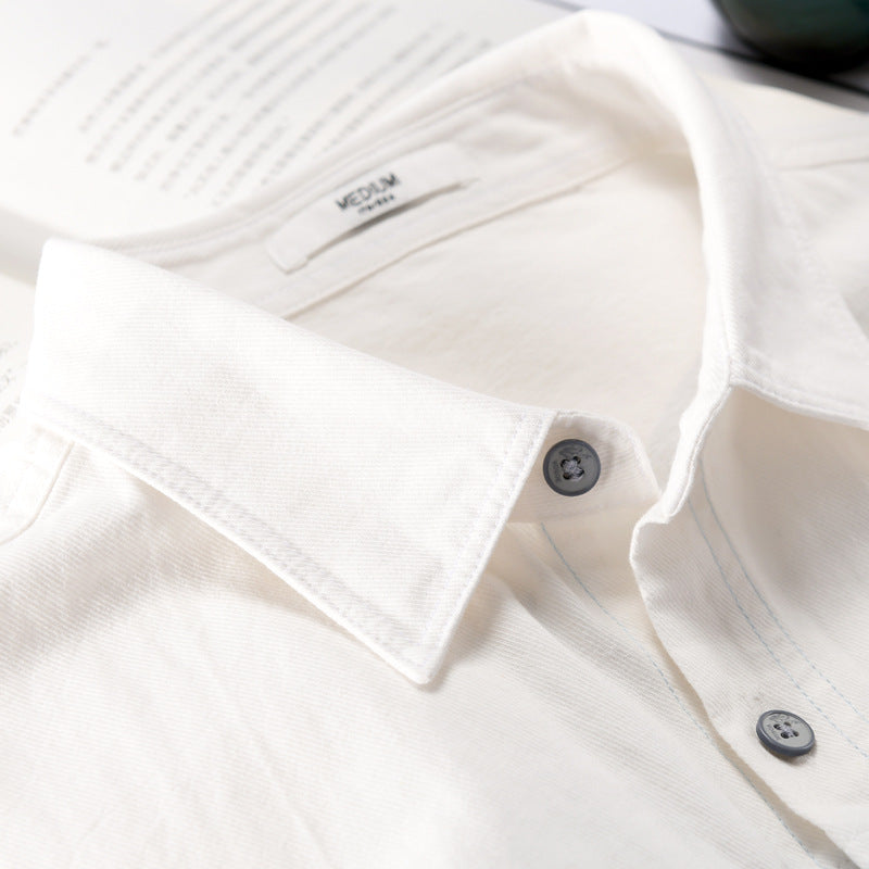 Chemise homme décontractée manches longues, alliant confort et style moderne pour printemps et automne.