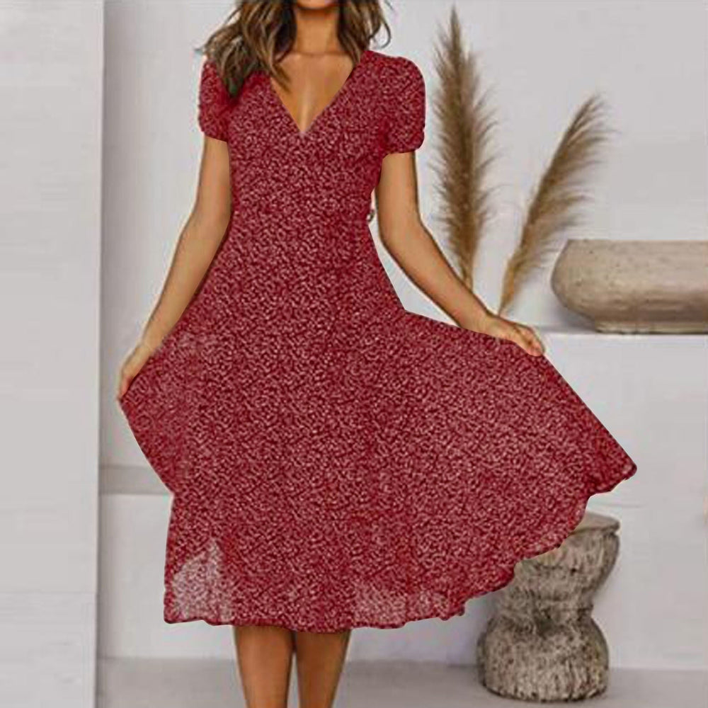 Robe fluide midi femme, parfaite pour la mode été. Son design évasé et élégant assure confort et style de jour.