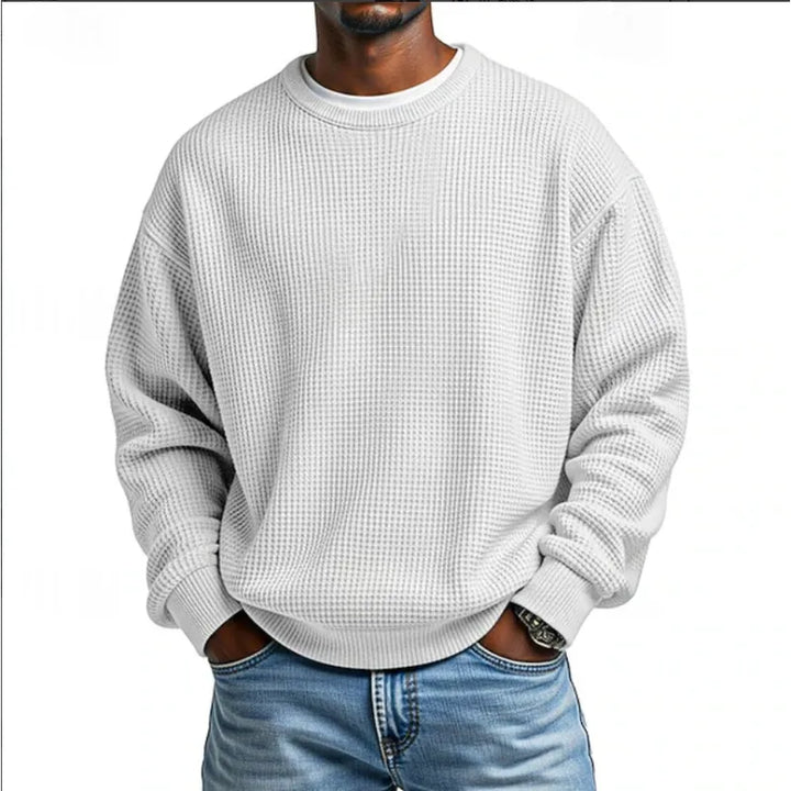 Sweatshirt homme décontracté gris, coupe confortable. Idéal pour un style polyvalent en automne/hiver. Vêtement mode.
