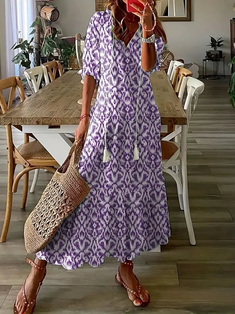 Robe de plage bohème femme, style décontracté, col V, volants et imprimé ikat tendance.