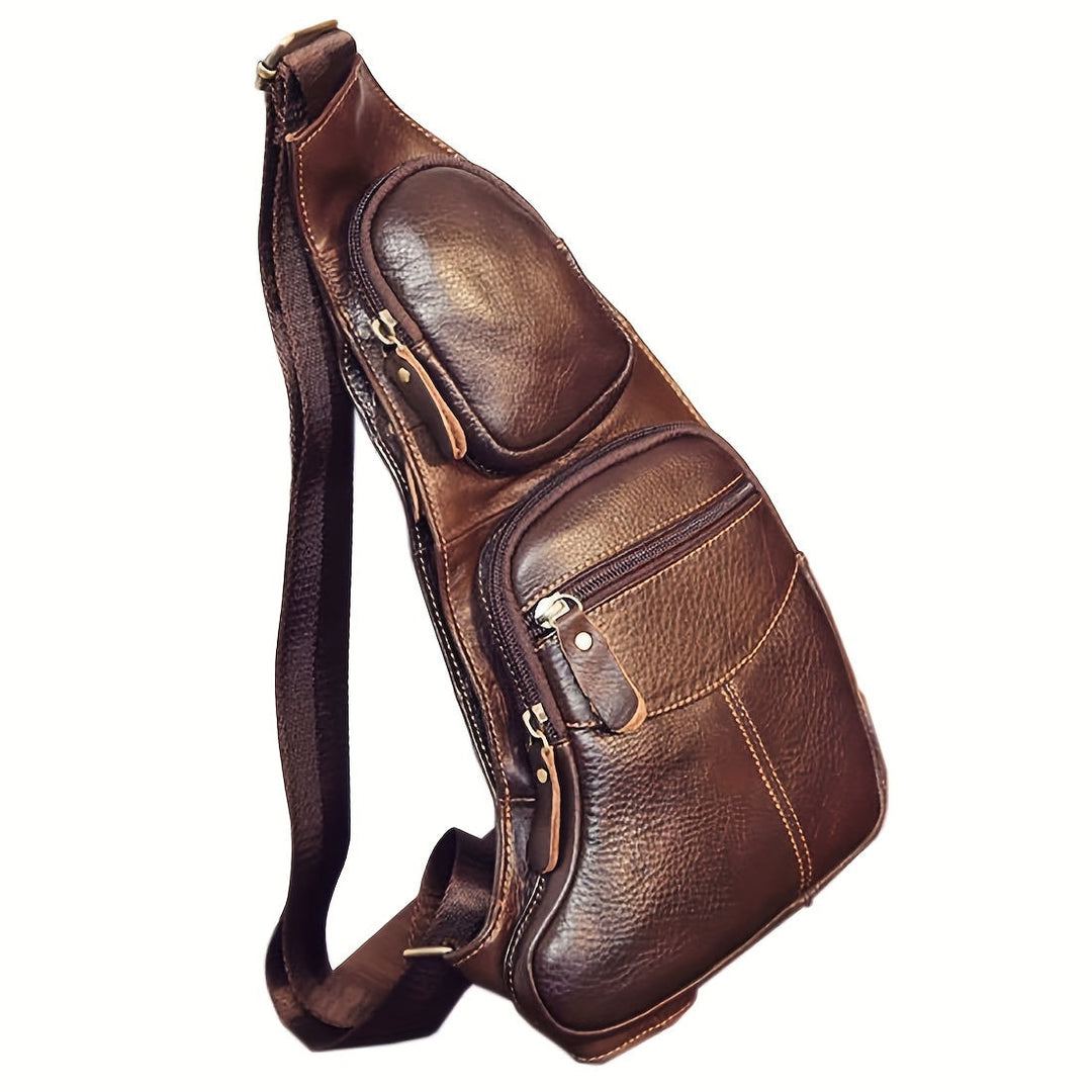 Sac bandoulière cuir vintage marron, compact et durable, idéal pour homme et femme en voyage.