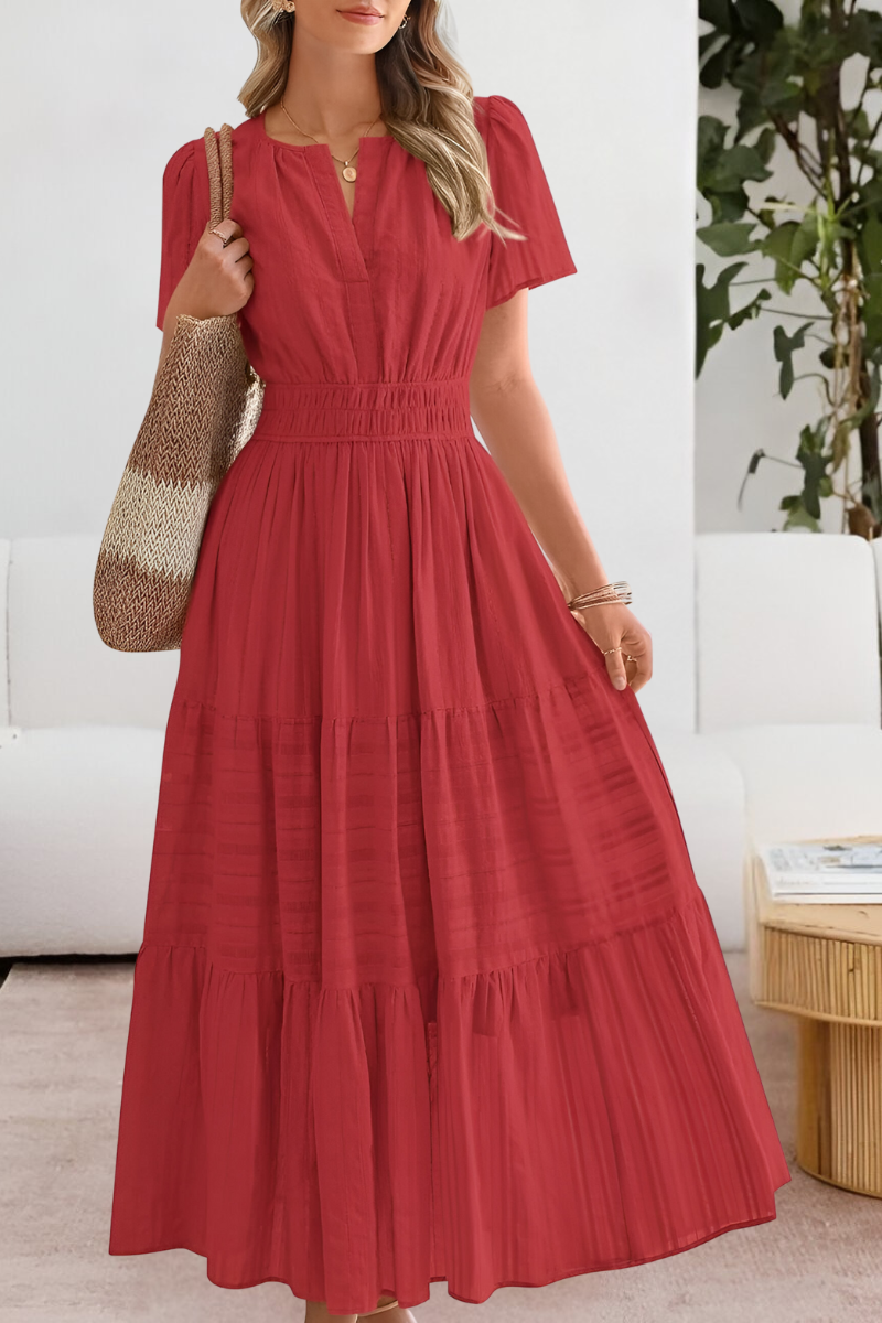 Robe midi bohème fluide pour femme, tendance été, look élégant et décontracté pour la plage.