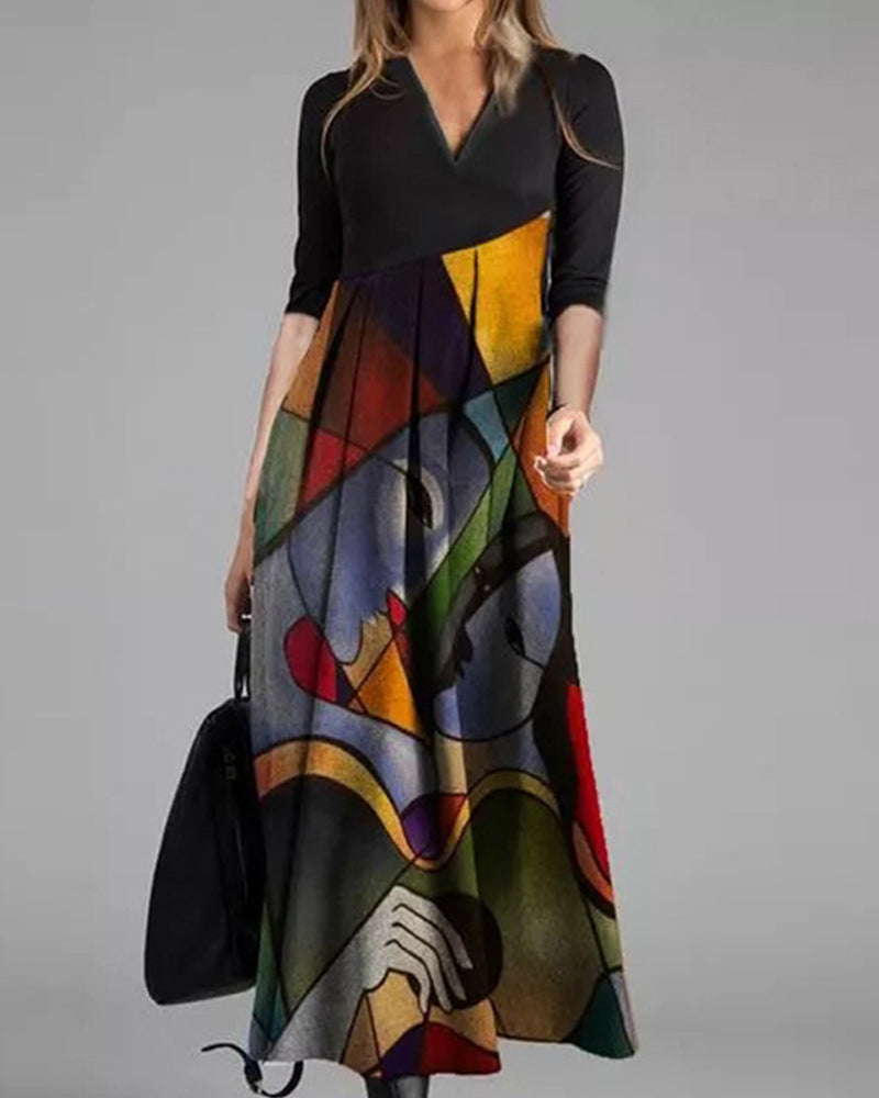Robe évasée femme élégante, manches longues, design color block et jupe plissée midi pour un look chic.