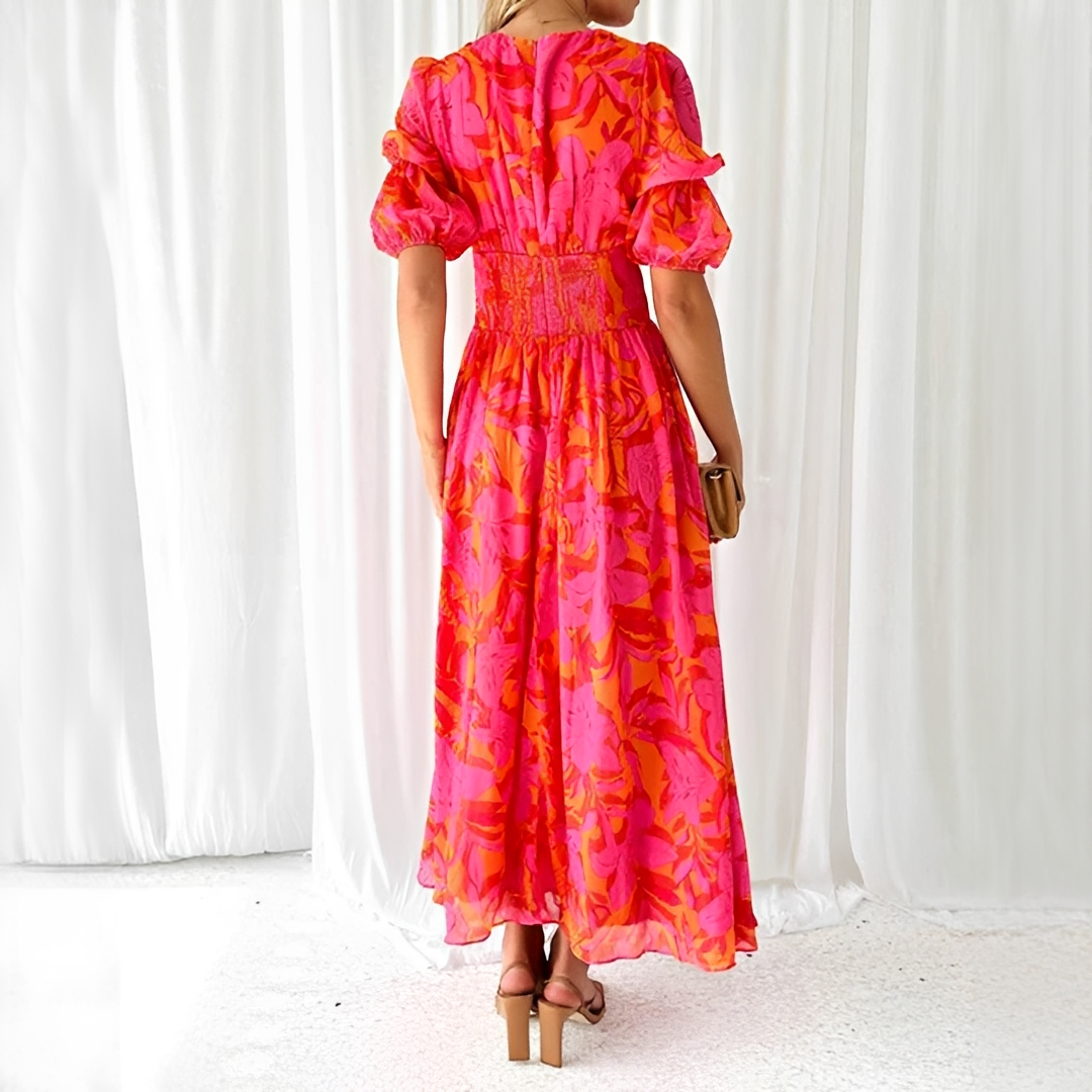Robe maxi fluide rose femme, col V, manches bouffantes. Style raffiné et confortable pour mariage, soirée, cocktail.