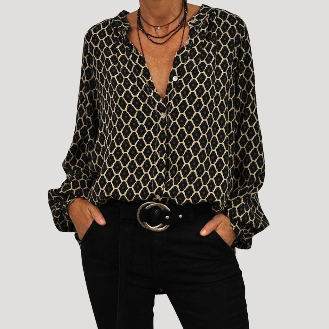 Chemisier à motifs décontracté-chic pour femme, col V et manches longues. Tendance mode féminine polyvalente printemps-automne.