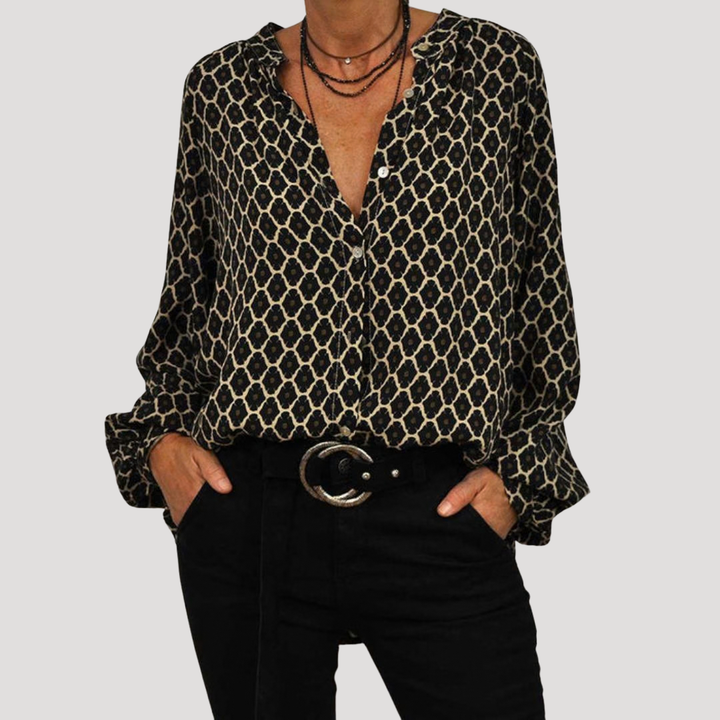 Chemisier à motifs décontracté-chic pour femme, col V et manches longues. Tendance mode féminine polyvalente printemps-automne.