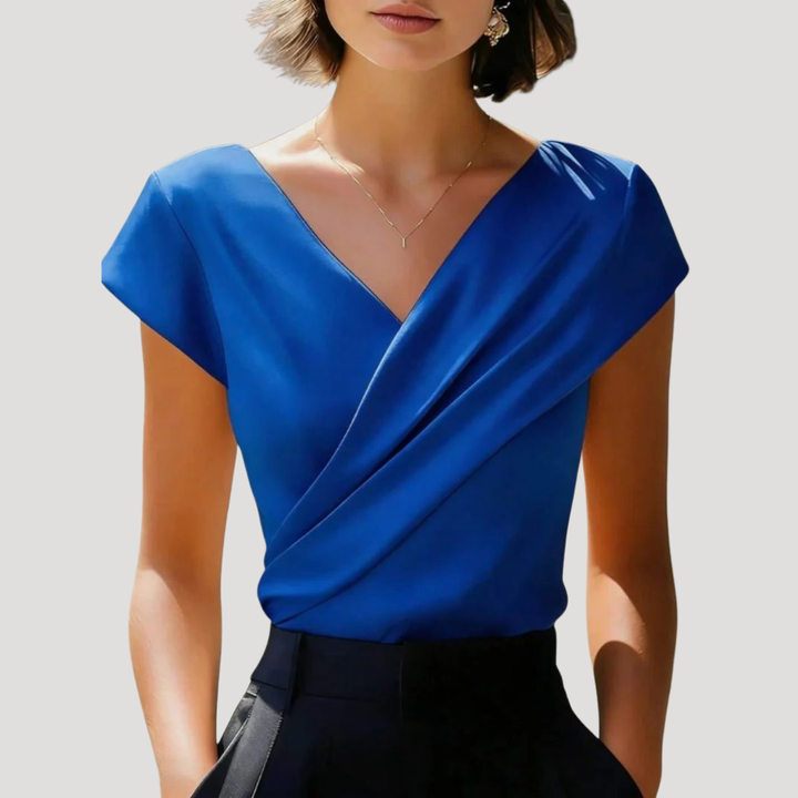 Blouse femme chic à col V cache-cœur et manches courtes, parfaite pour l'élégance au quotidien.