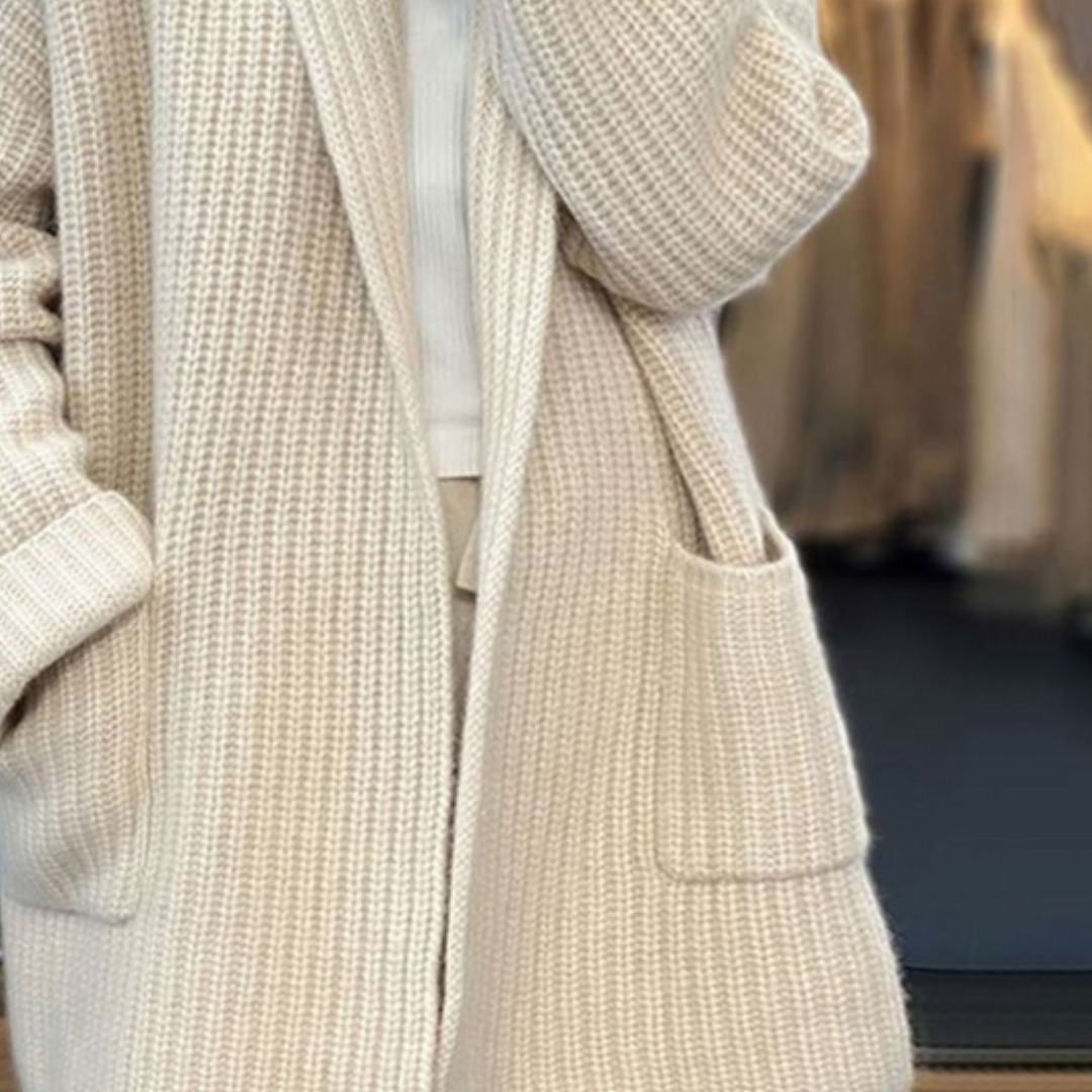 Élégant gilet long Irene pour femme, parfait pour allonger la silhouette en automne.