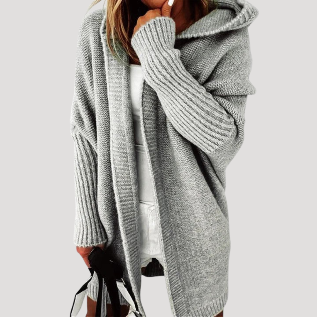 Gilet long oversize femme avec capuche, style décontracté chic pour l'automne-hiver.