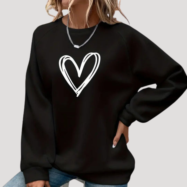 Chandail femme élégant et décontracté, col rond, motif cœur, parfait pour un look quotidien.