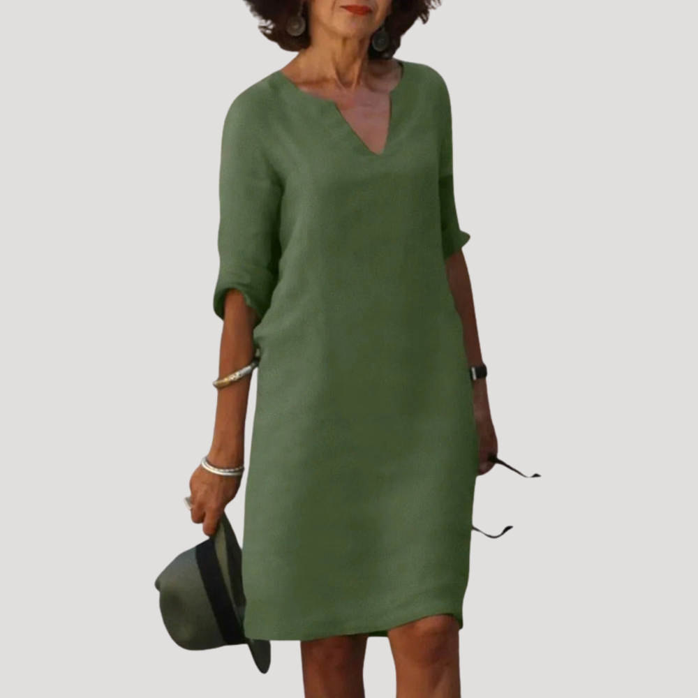 Élégante robe midi femme fluide avec col V, idéale pour un look chic et décontracté au quotidien, très confortable.