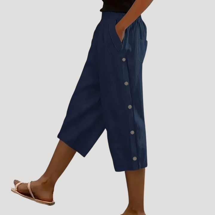 Pantalon large mi-long femme coupe ample, style décontracté. Confortable et fluide, idéal pour mode été élégante et légère.