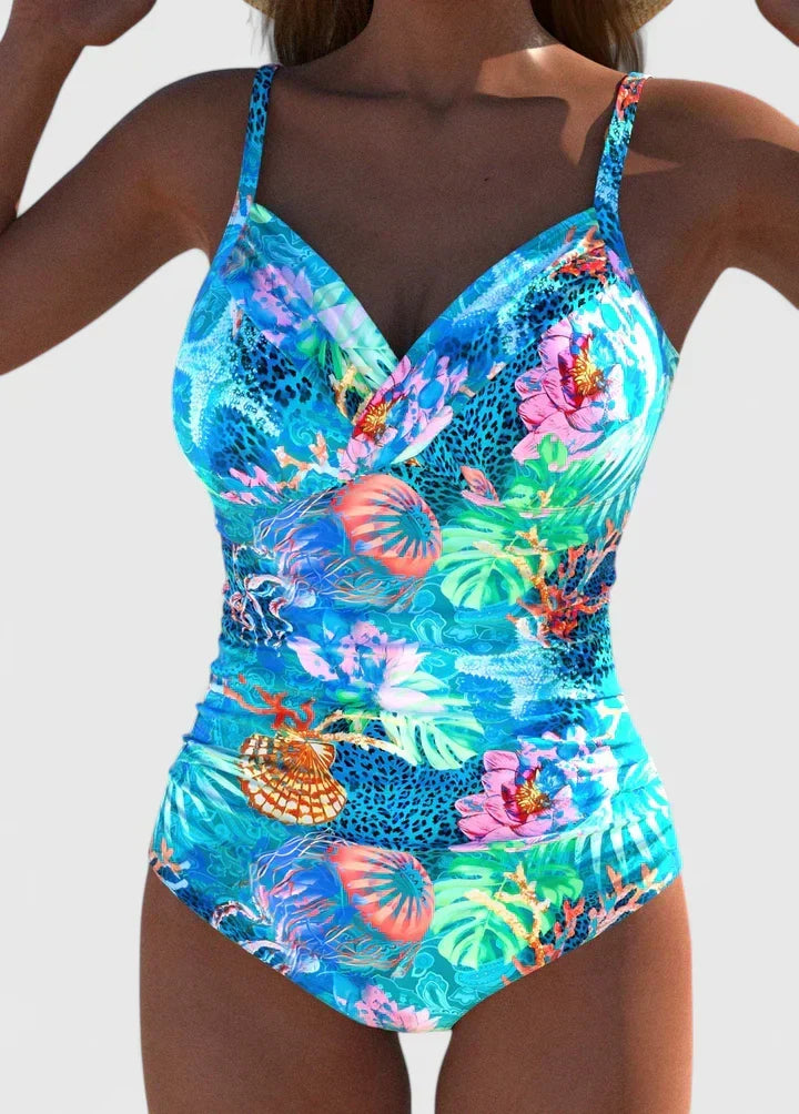Élégant maillot de bain femme tropical une pièce froncé, col V, parfait pour la plage et l'été.