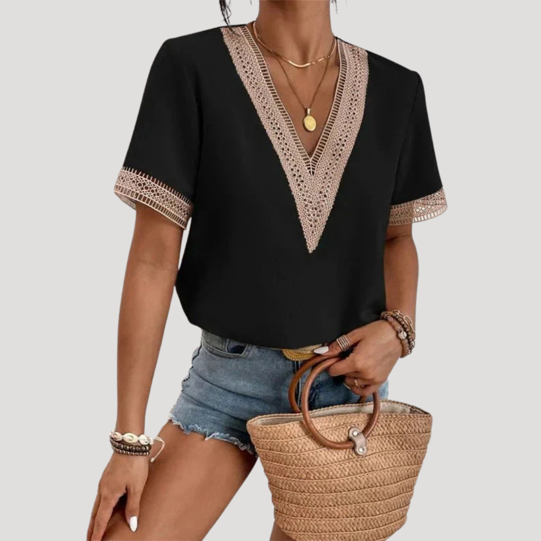 Blouse femme élégante et légère en dentelle pour l'été. Style chic, manches courtes et col en V. Confort absolu.