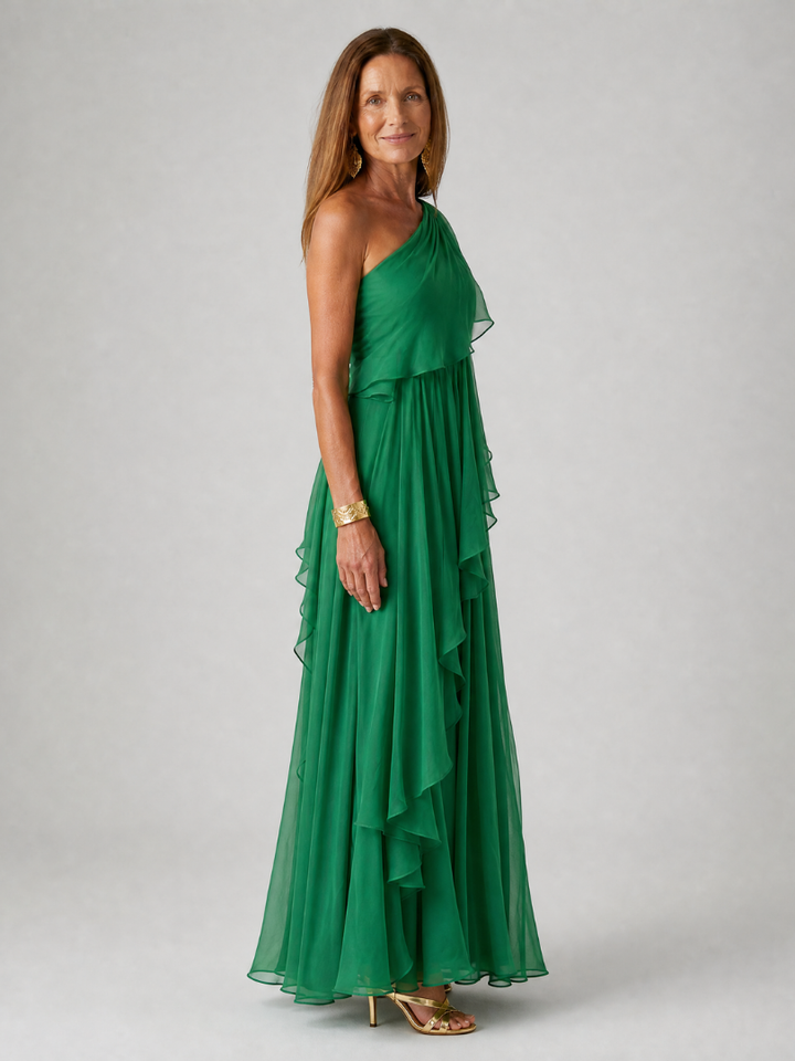 Robe fluide maxi femme, asymétrique avec volants, style romantique pour le printemps.