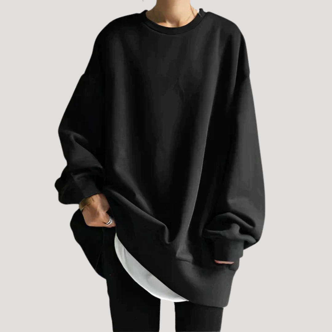 Pull oversize femme col rond, doux et confortable pour un style décontracté mode automne-hiver.