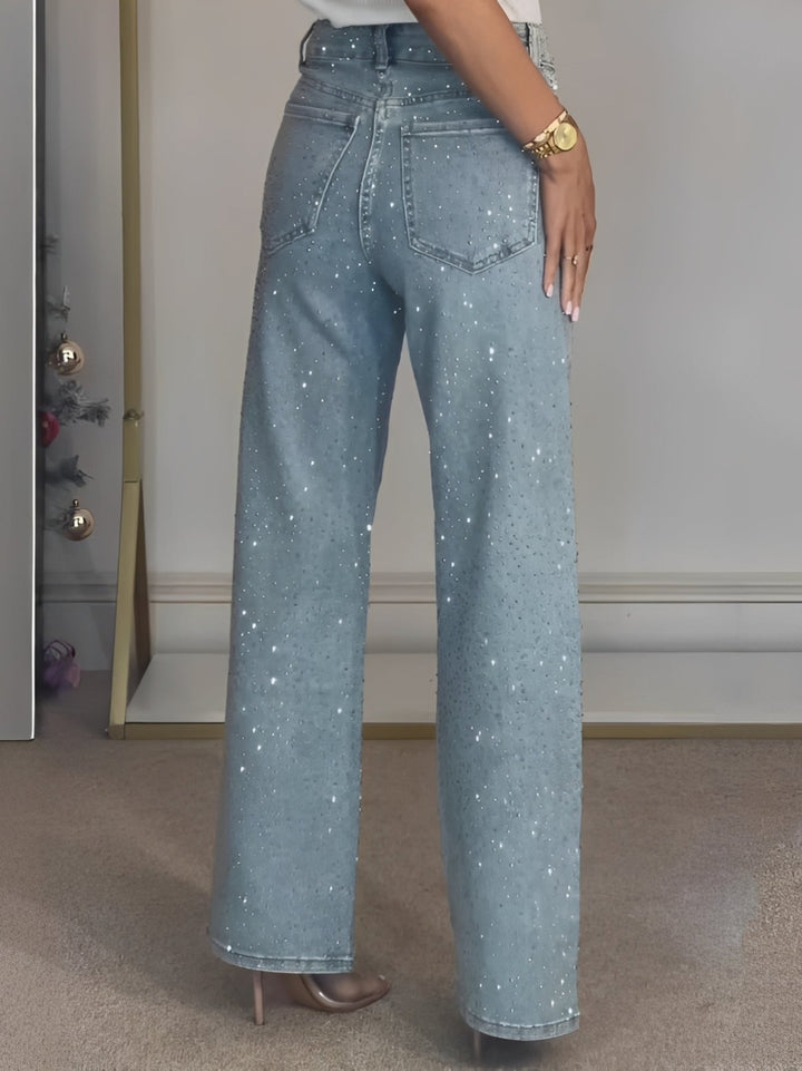 Jean taille haute brillant pour femme, design chic et moderne, idéal pour un outfit féminin et élégant.