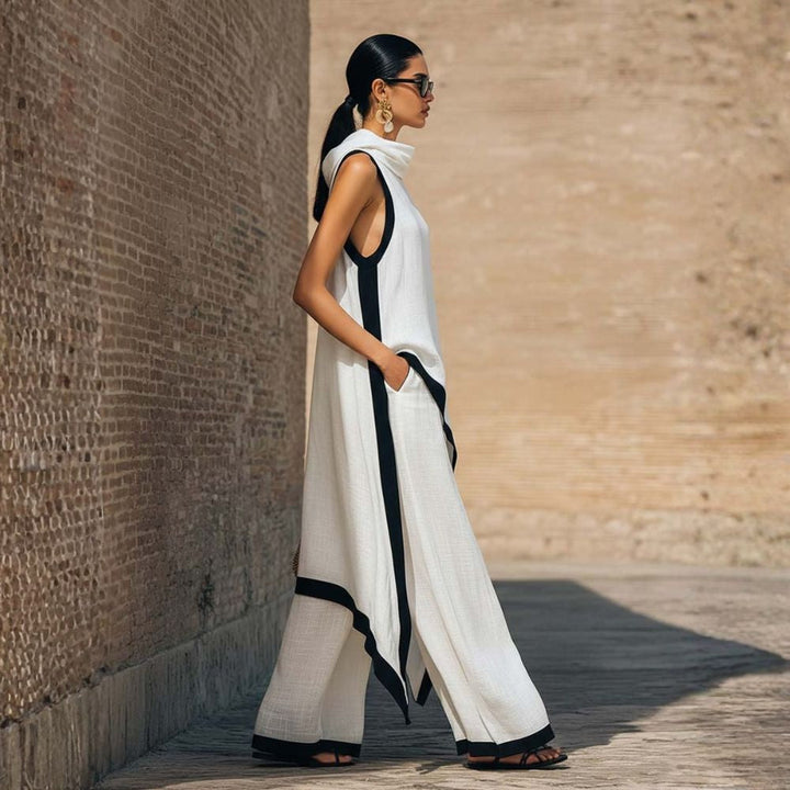 Femme portant un ensemble lin coton fluide, tunique asymétrique et pantalon large, pour un look estival chic.